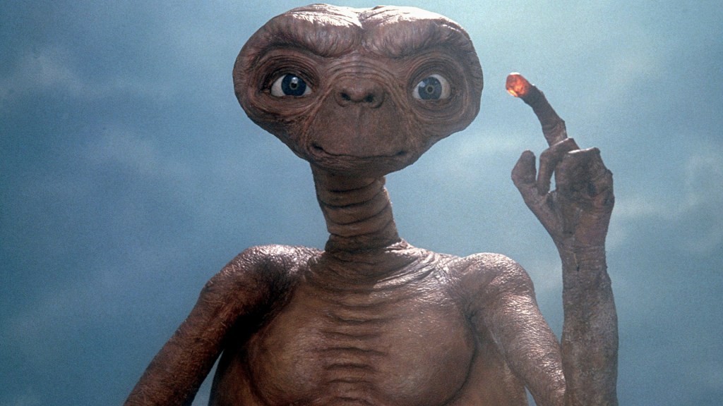 Image of ET the alien from the 80s movie, with his lit up finger.